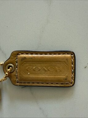 Coach Hang Tag